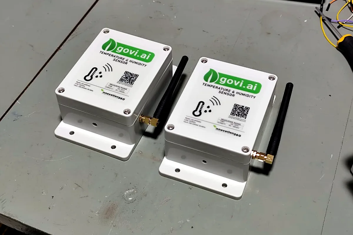 Govi AI temperature and humidity sensor units on a workbench